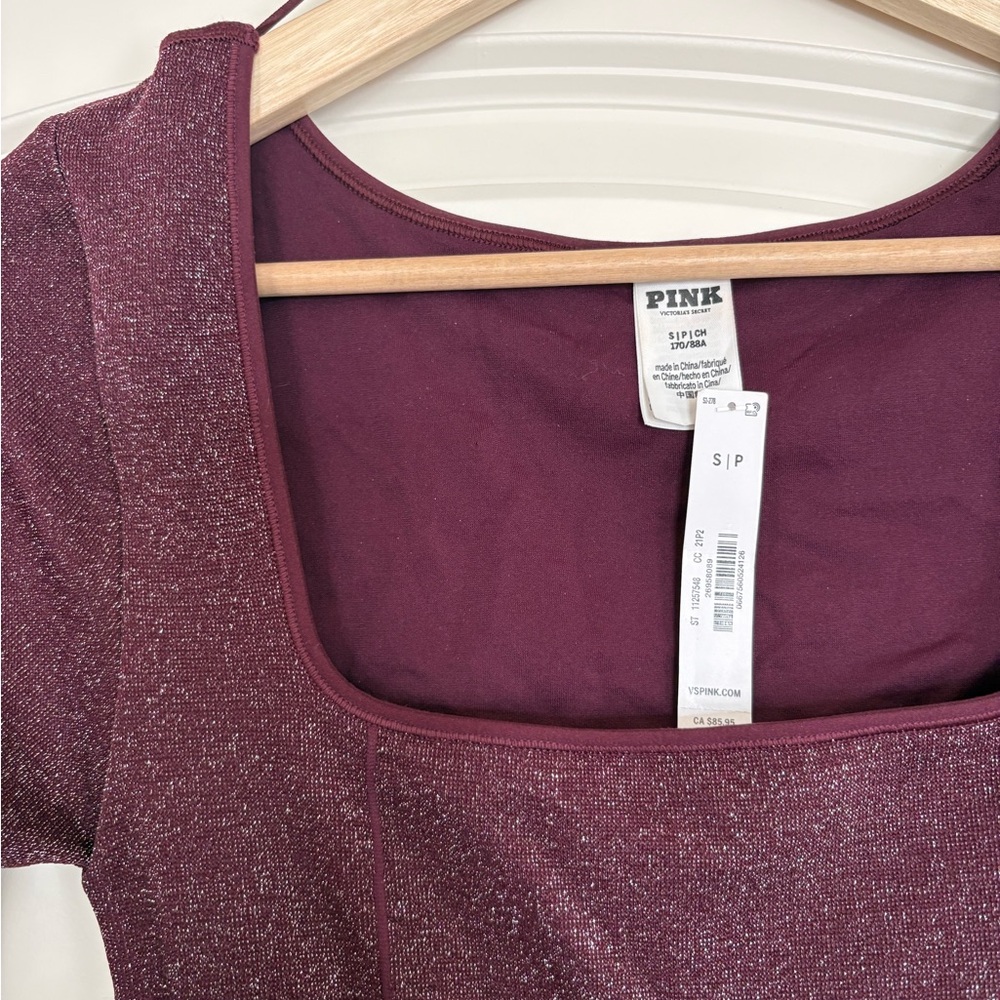 Pink Victoria’s Secret Shimmering Burgundy body suit Small